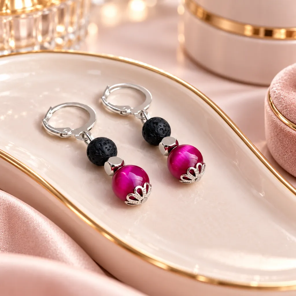Boucles d’oreilles fuchsia sur plateau doré.webp