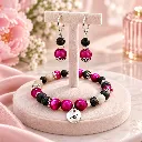 Ensemble bijoux rose et lave noire geschniegelt.webp