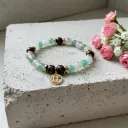 Bracelet en Pierre précieuse Breloque dorée signe du zodiaque Gémeaux